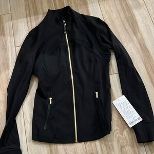 Reposhed: lululemon athletica Black Jacket with Gold Accents